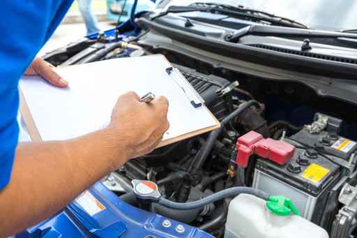 Picture of a man with a clipboard - Auto Repair Service in Bedford PA